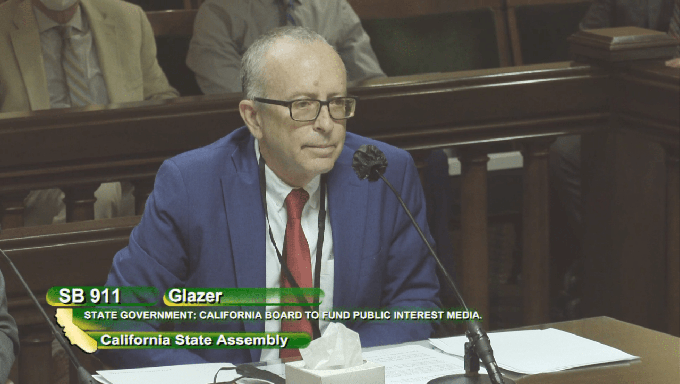 Image caption: Daniel Weintraub, chief of staff to state Sen. Steve Glazer, speaks at an Assembly committee hearing in Sacramento on Wednesday, July 29.