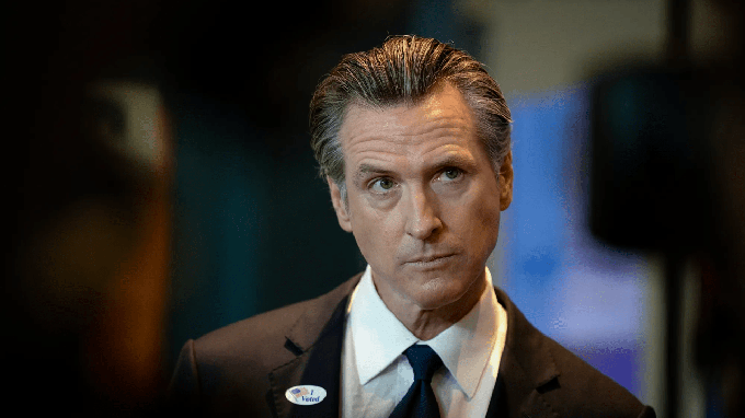 Image caption: Gov. Gavin Newsom addresses the media after casting his ballot on election day at the California Museum in Sacramento on Nov. 8, 2022.