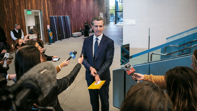 Image caption: Gov. Gavin Newsom explains why he withheld, then released, $1 billion for local governments to reduce California homelessness. The two sides met in Sacramento on Nov. 18, 2022.