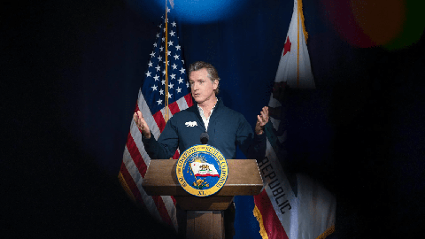 Image caption: Gov. Gavin Newsom unveils his budget proposal for the 2023-24 fiscal year during a press briefing at the California Natural Resources Agency in Sacramento on Jan. 10, 2023.