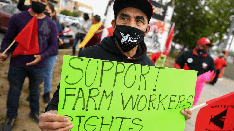 Image caption: Farmworker Inocencio Cortez joins the rally in downtown Fresno on Cesar Chavez Day to help urge Gov. Gavin Newsom to sign the Ag Labor Voting Choice Act, providing more choices in how farm workers can vote in their union elections.