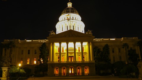 Image caption: California's budget crunch may means lights out for new state spending, even on worker pay.