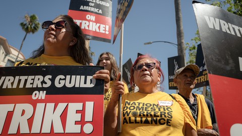 Image caption: Striking Hollywood actors and screenwriters are seeing support from other labor unions, such as the Domestic Workers Alliance.