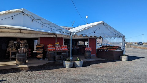Image caption: Rodin Farms Fruit Stand lies along one of the “stroads” in Stanislaus County, and a widening of the highway could drive the longtime landmark out of business.