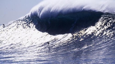 Image caption: Ocean waves may be good for more than surfing. They may play a role in reducing California's greenhouse gas emissions.