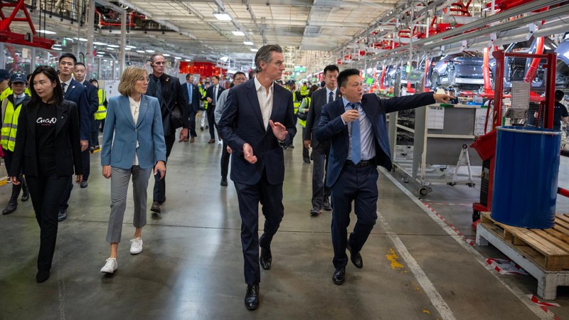 Gov. Gavin Newsom tours a Chinese electric-car factory in October, 2023.