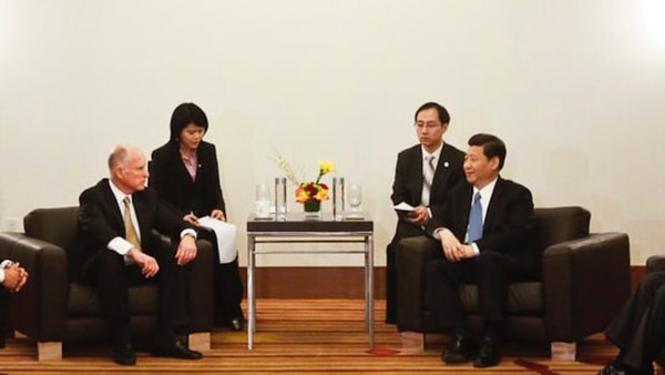 Gov. Jerry Brown meets with Chinese leader Xi Jinping at an economic summit in LA in February, 2012. Since being named Chinese president later that year, Xi has earned harsh criticism for human rights violations, and praise for his environmental policies.