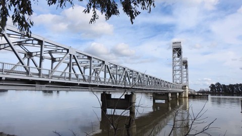 Image caption: A view of the Helen Madere Memorial Bridge crossing the Sacramento River at Rio Vista in Solano County, California.