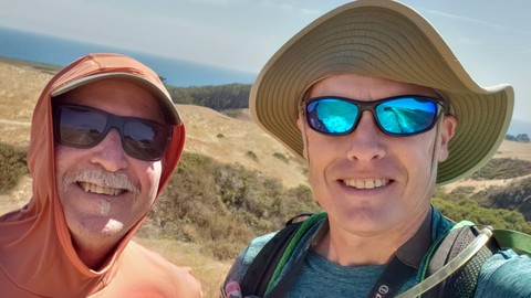 Image caption: The author, left, with Hilltromper Managing Director Mike Kahn at the Cotoni Coast Dairies National Monument.