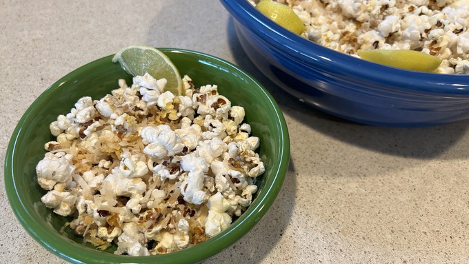 Served with lime slices, this toasted coconut-lime popcorn makes a great appetizer with your favorite beverage.