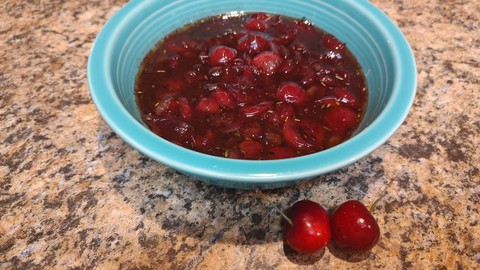 Image caption: Savory cherry sauce with sweet onions makes a wonderful accompaniment to grilled pork.