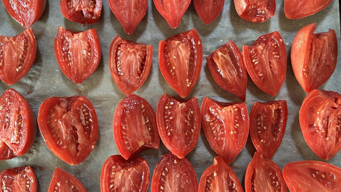 Washed, cored and sliced, these Rugby tomato halves at this point can be frozen or, with maybe a little salt or olive oil added, roasted. Check out the tomato-saving tips in the Garden Basics podcast.
