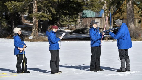 Image caption: Department of Water Resources crew members measure the snowpack at Phillips Station on Thursday.