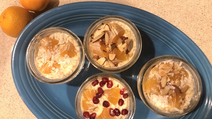 Mandarin tapioca parfaits can be tailored to individual tastes. These all include mandarins, but for accent use, clockwise from bottom, pomegranate arils, shredded coconut, toasted almond slices, and a combination of coconut and almonds.