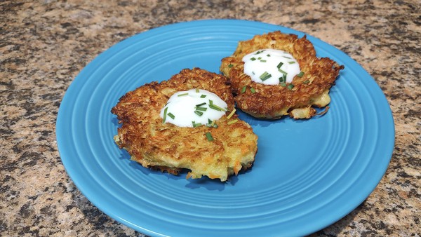 These squash and carrot fritters make a great side dish, but also can be cooked mini-size for appetizers.