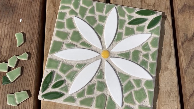 Paricipants in the Dec. 10 workshop will create a flower mosaic tile, which can be used as a trivet, plaque or garden decor.