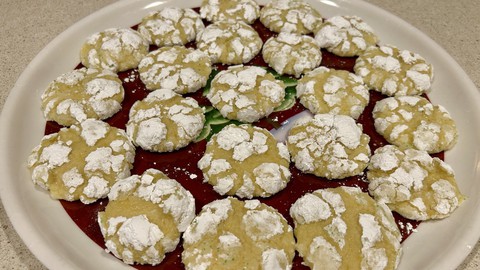 Image caption: Crinkle cookies made with ripe limes are ready for a party.