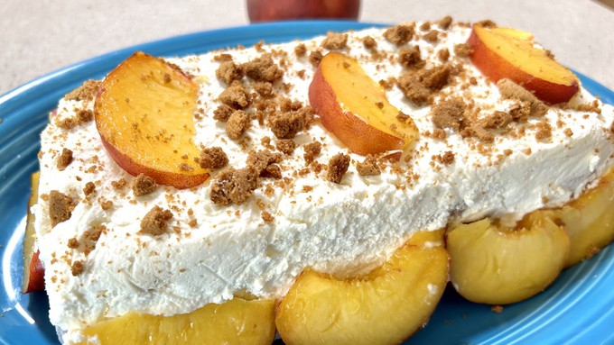 Cool and creamy, this peach icebox cake features ginger snaps as the "cake" base. But other cookies can be used -- other fruit, too.