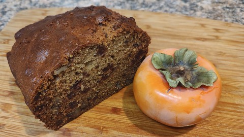 Image caption: This tea bread uses about four very ripe persimmons, of either variety.