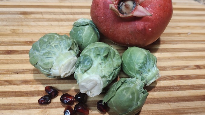 Image caption: Brussels sprouts and pomegranate arils combine for a perfect holiday color combination.