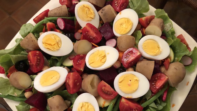 This colorful, flavorful salad combines vegetables from late summer harvests with the first potatoes and radishes of fall. Eggs boost the protein content.