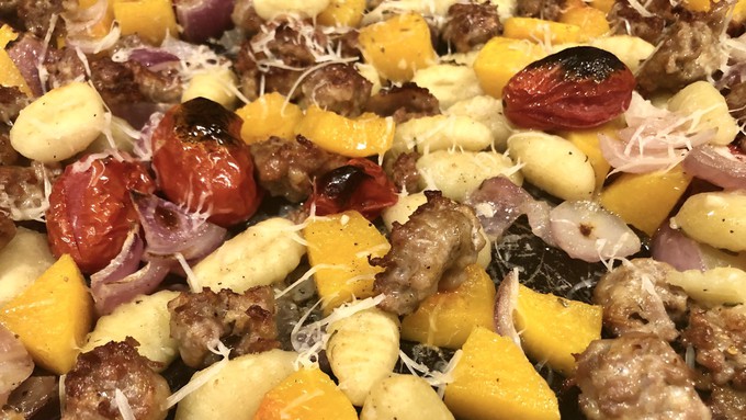 Potato gnocchi roasted with vegetables and sausage makes an easy one-pan meal.