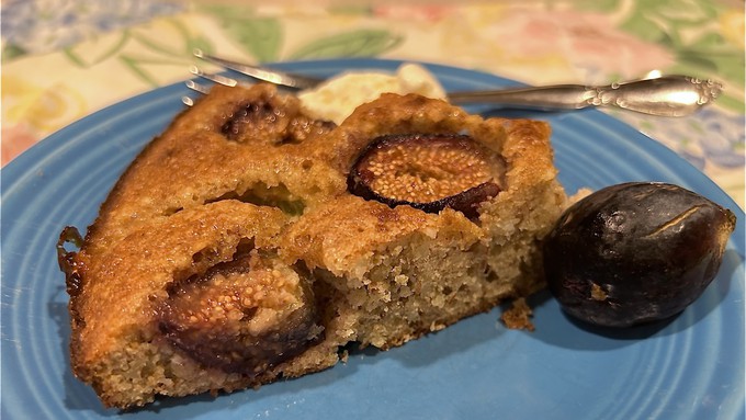 This fig cake is more of a rustic torte, with its ground-almond base. Enjoy with morning coffee or, as here, with a scoop of vanilla ice cream for dessert.