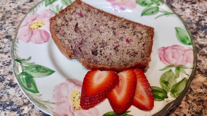 Strawberries and walnuts give this quick bread its flavor.