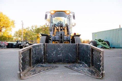 Image caption: "The Claw" ends its winter rounds of green waste pickups in Sacramento on Feb. 3.