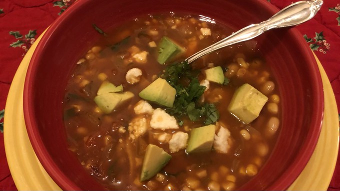 This vegetarian tortilla soup can be spiced from mild to hot and garnished to taste.