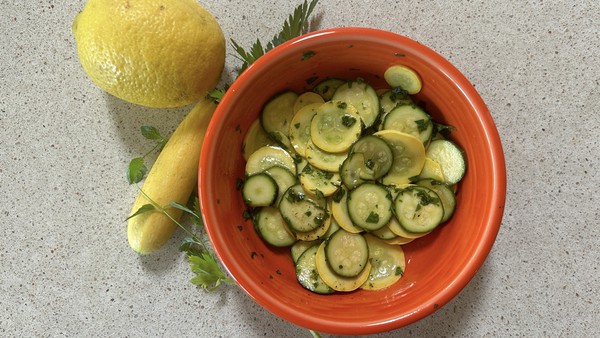 Herbs added just before serving finish off this  salad that makes use of smaller zucchini and summer squash.