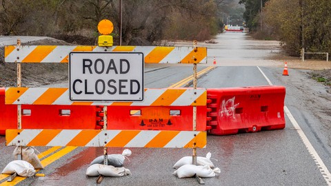 Image caption: Flooding on the Salinas River in 2023 brought economic hardship to farmers and snarled traffic.