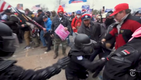 Image caption: Trump supporters are seen in the NY Times video “Days of Rage” attacking police officers at the Capitol on Jan. 6, 2021. About 140 officers received injuries ranging from lacerations to concussions, rib fractures and chemical burns.