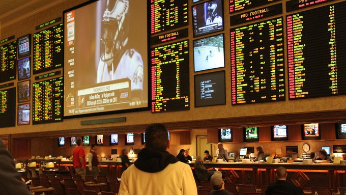 Image caption: Betting on sporting events such as the Super Bowl may soon be legal in California.