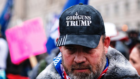 Image caption: Supporters of Donald Trump have been behind a series of disruptions and threats at local government meetings.