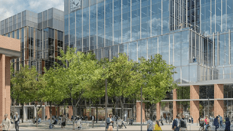 Image caption: An artists rendering of the Life Long Learning Building now under construction at Aggie Square, as seen from from Stockton Boulevard.