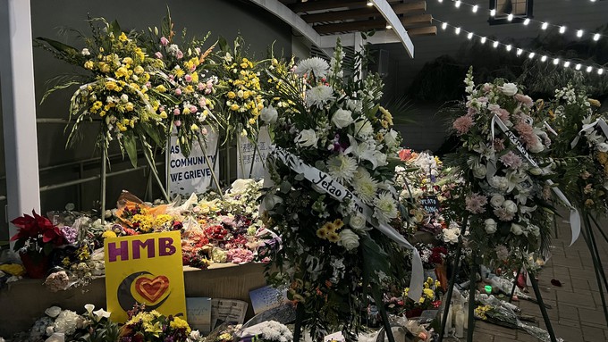 Image caption: A memorial to the seven victims slain in a mass shooting in Half Man Bay in January 2023.