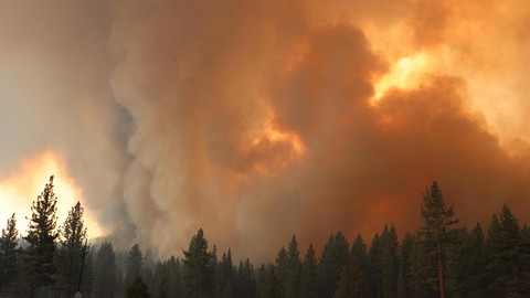 Image caption: If policymakers accelerate efforts to slow climate change, California could get some relief from wildfires.