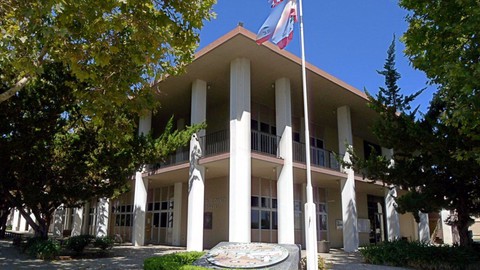 Image caption: Lawyers with the public defender and district attorney face each other at trial in the San Benito County courthouse.