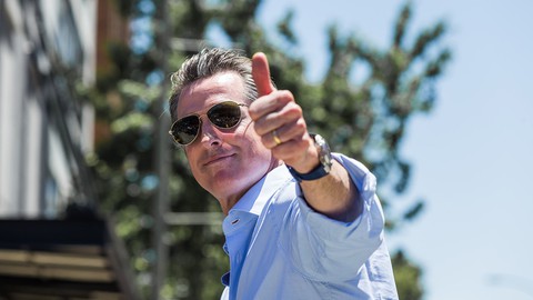 Image caption: Gavin Newsom has reason to be upbeat after crushing an attempt to recall him on Sept. 14.