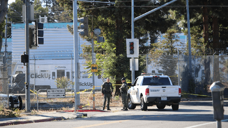 Santa Clara County Sherrif's deputies block access to the VTA railyard a day after the 2021 San Jose shooting where 9 people were killed.
