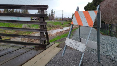 Image caption: Winter storms can lead to flooding in Santa Clara County’s creeks, such as this January 2022 incident on San Tomas Aquino Creek.