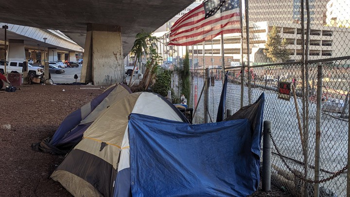 A homeless encampment under Highway 87 at San Fernando Road in downtown San Jose.