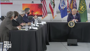 President Donald Trump sits across from California Governor Gavin Newsom at a press conference on the state’s increasingly destructive fire season. Screen shot from the PBS NewsHour YouTube channel.