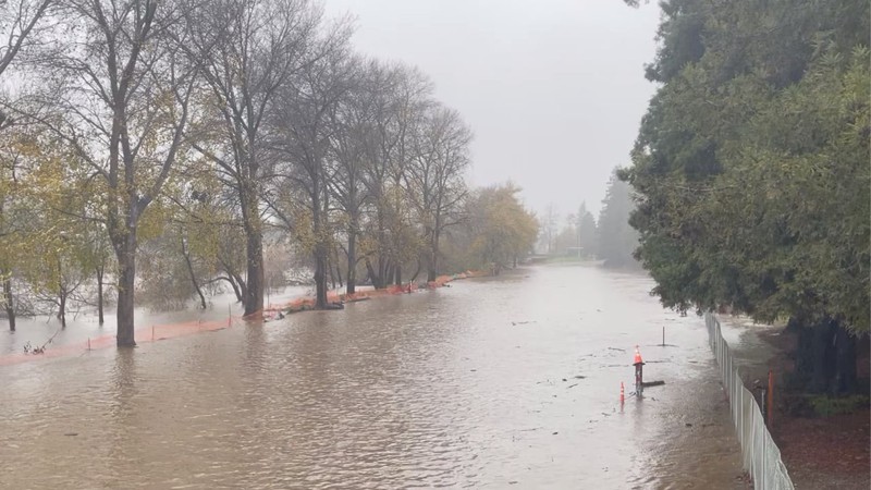 View of the flooded San Lorenzo River Park Benchlands in Santa Cruz, California on New Year's Eve 2022.