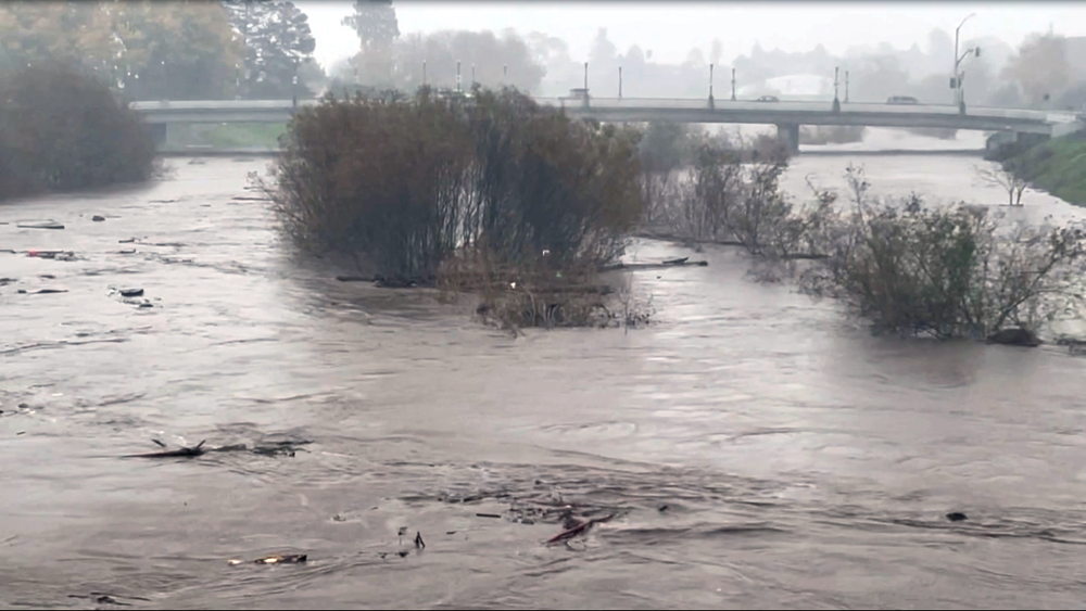 A view of the San Lorenzo River from the Soquel Avenue Bridge—which fared better in this storm than in 1982, when it collapsed.