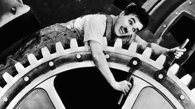 Image caption: A screenshot from “Modern Times” (1936), Charlie Chaplin’s meditation on the vicissitudes of labor.