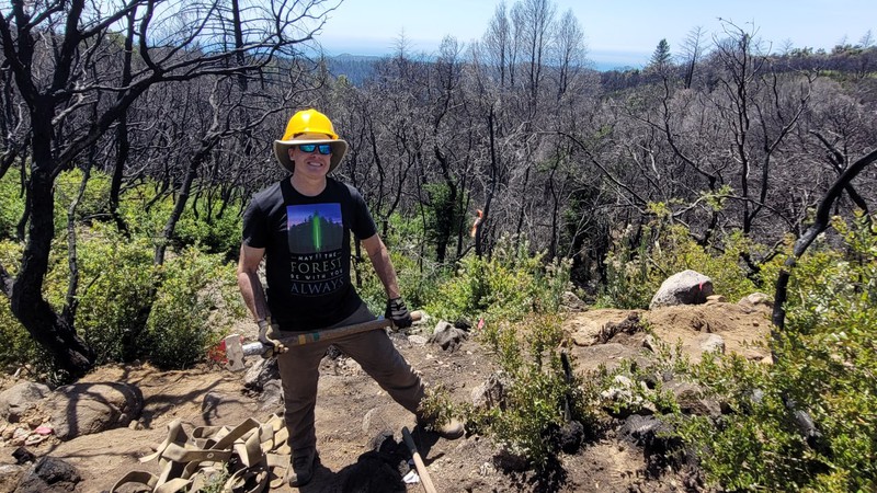 Mike Kahn, Hilltromper's managing director, doing volunteer trail work with Santa Cruz Mountains Trail Stewardship at San Vicente Redwoods.