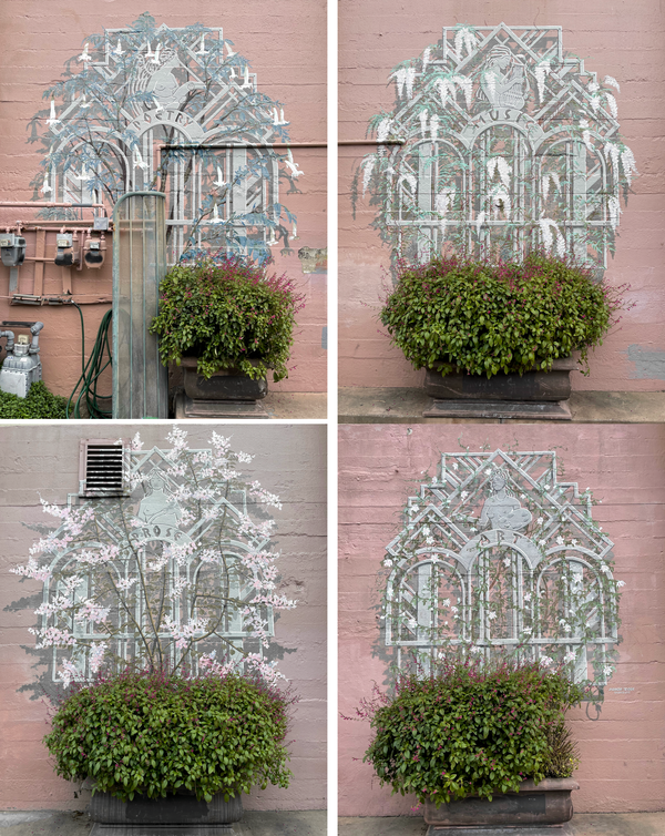 The Four Muses, as depicted in a four panel series on the side of the Old Theatre Building.