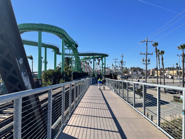 In the middle of the span over the river, looking southwest toward the Boardwalk.